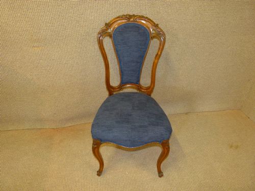 Walnut Set of Four Chairs