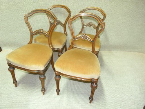 Set of Four Walnut Chairs

