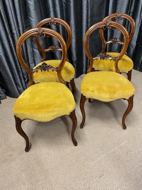 Four Walnut Dining Chairs