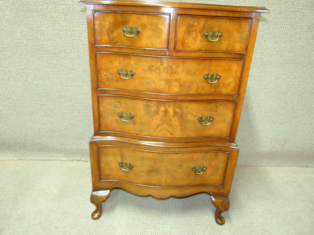 Walnut Sepentine Chest of Drawers