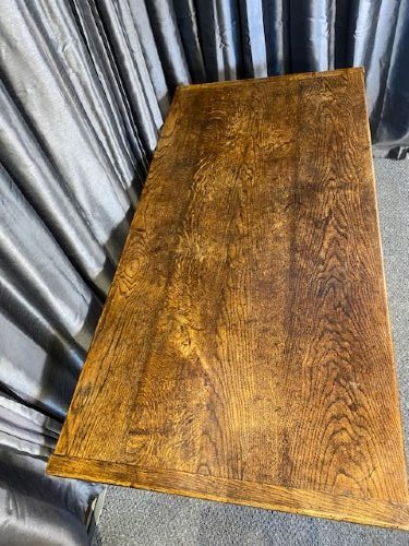 A solid oak refectory dining table featuring a broad rectangular top, twin turned pillar supports, and a floor-level stretcher base. View II