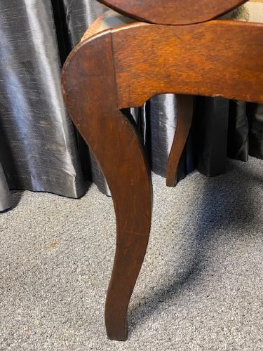A carved mahogany carver armchair featuring reeded scroll arms, a sculpted double-circle back splat, and a floral upholstered seat. View IV