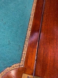 An Edwardian mahogany envelope card table featuring floral marquetry inlay on four folding flaps, a single drawer with brass knobs, and square tapered legs. View VIII