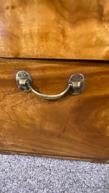 A rectangular camphor wood military campaign chest featuring brass corner brackets, flush brass handles, and a central brass keyhole escutcheon. View IV