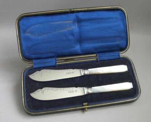 Silver & Mother of Pearl Butter Knives.