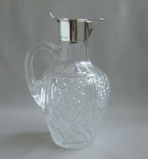 Antique Silver Mounted Claret Jug.