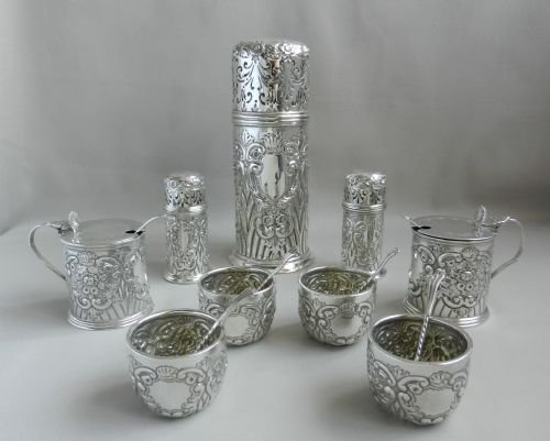 Antique Silver Nine Piece Condiment Set.