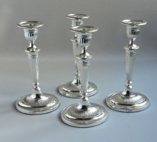 Set of Four Antique Silver Candlesticks.