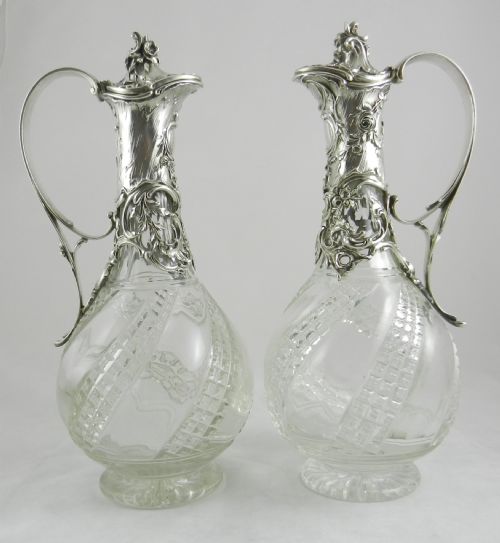 Pair Antique Silver Mounted Claret Jugs.