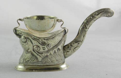 Indo-chinese Silver Tea Strainer.