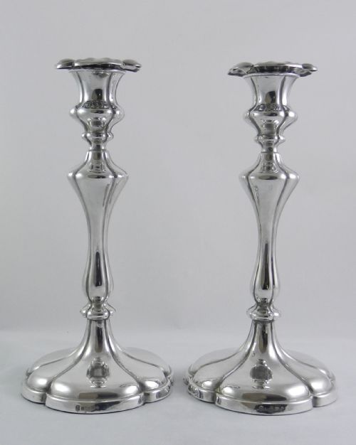 Antique Silver-plated Elkington Candlesticks.