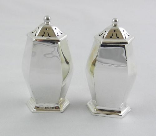 Antique Silver Pepper Pots.