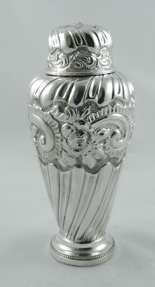 Large Antique Silver Caster.