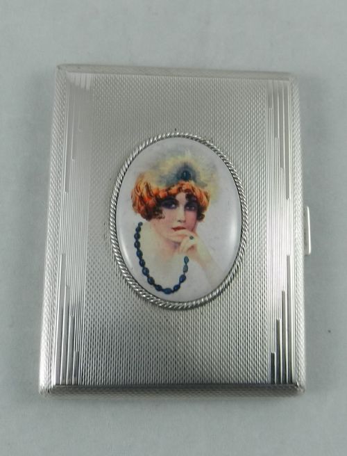 Silver & Enamel Cigarette Case.