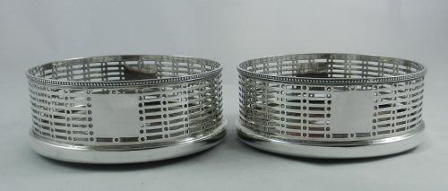 Antique Silver Wine Coasters.