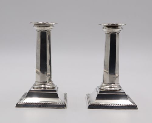 Pair Silver "Piano" Candlesticks.