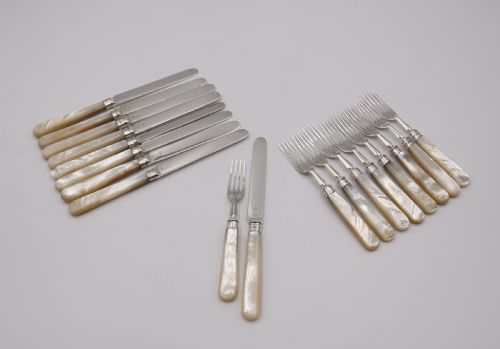 Set  of Nine Pairs of Antique  Silver Dessert Cutlery.