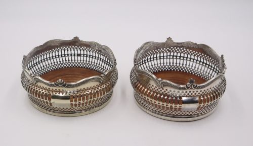 Pair Antique Silverplated Coasters.