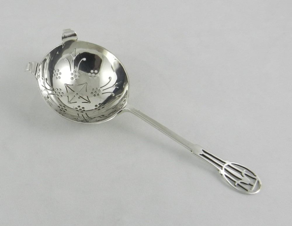 Art Deco Silver Tea Strainer.