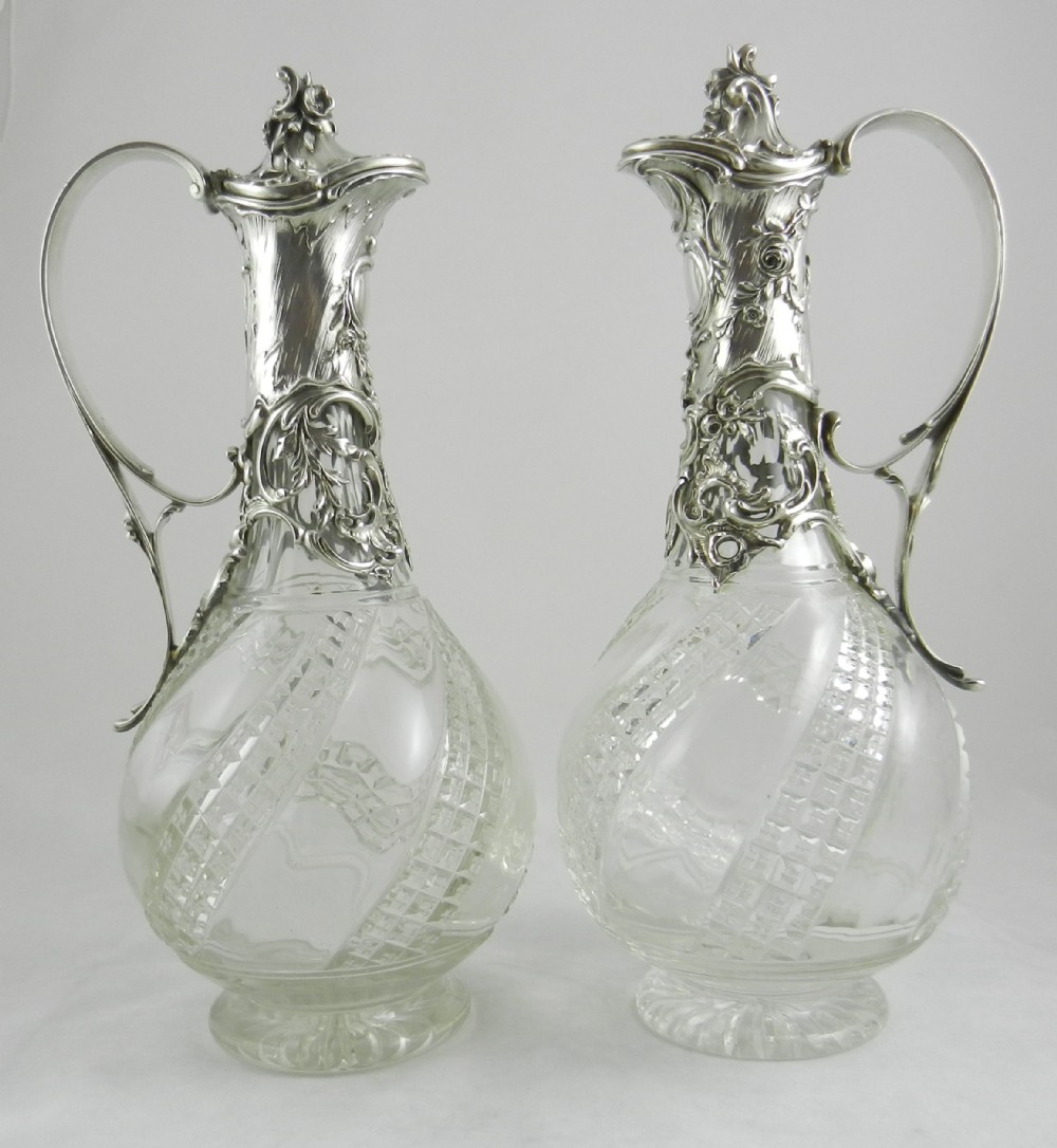 Pair Antique Silver Mounted Claret Jugs.