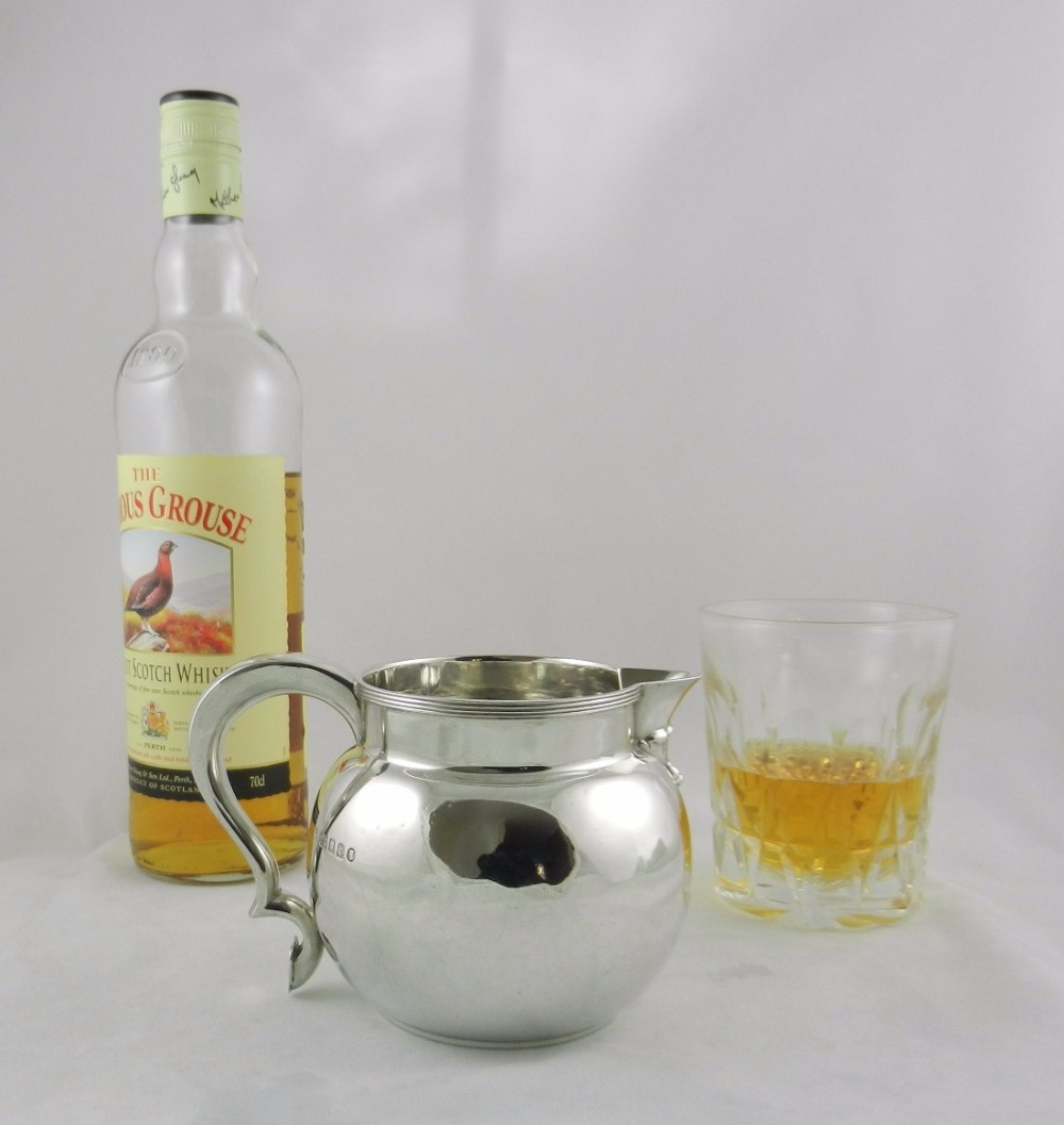 Silver Whisky Water Jug.
