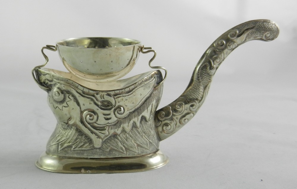 Indo-Chinese Silver Tea Strainer.
