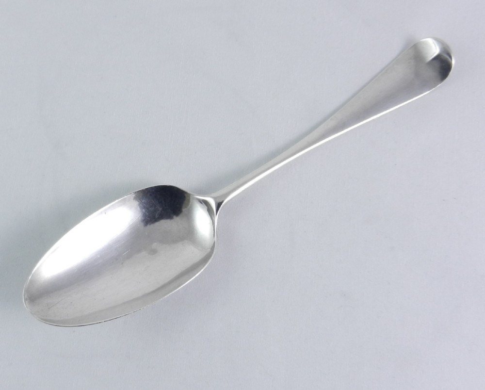 Geo. III Silver Scroll-Back Spoon.