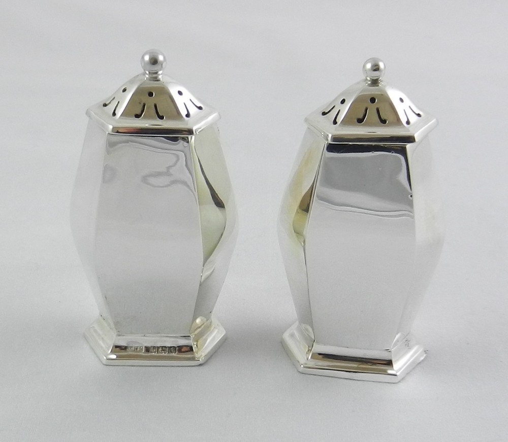 Antique Silver Pepper Pots.