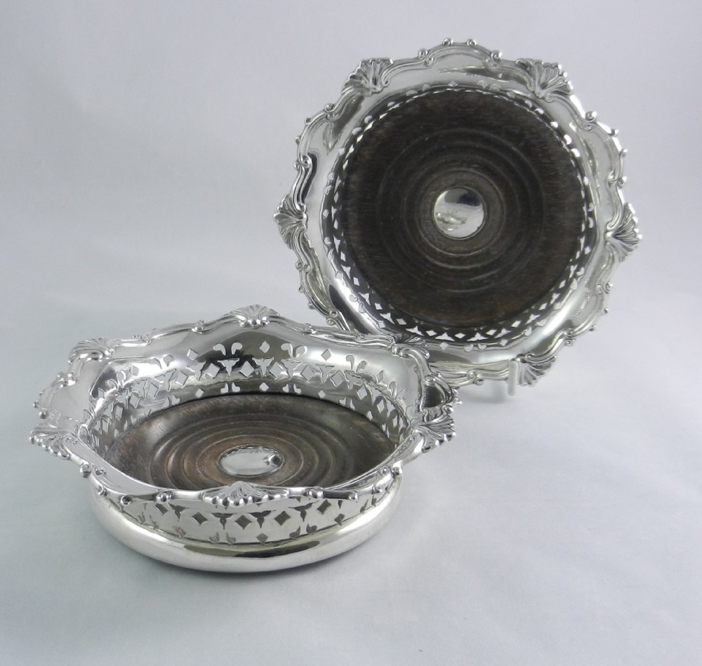 Antique Silver Wine Coasters.