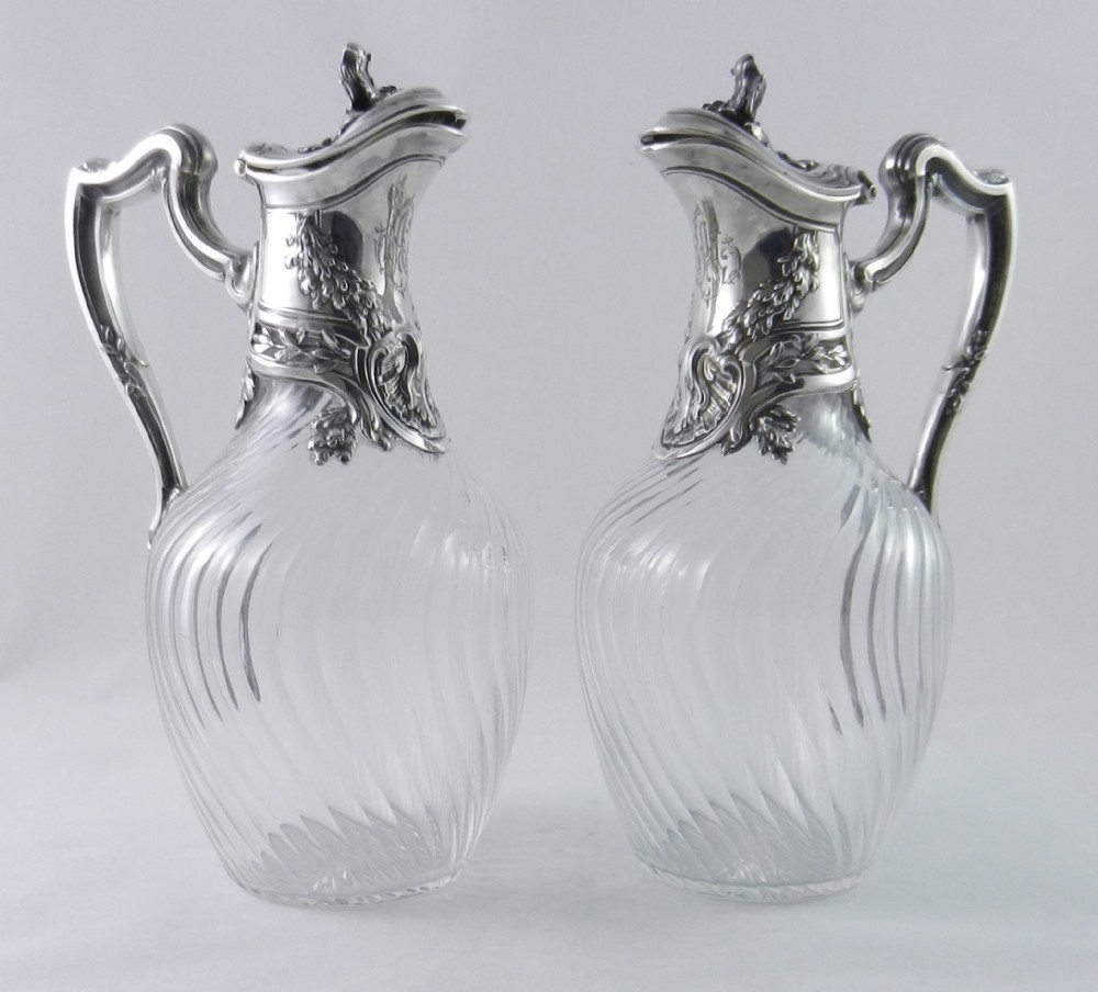 Pair Antique Silver-Mounted Claret Jugs.