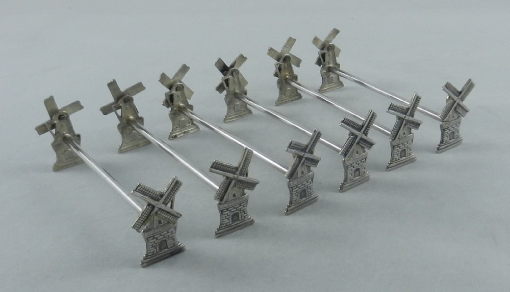 Antique Silver Knife Rests.