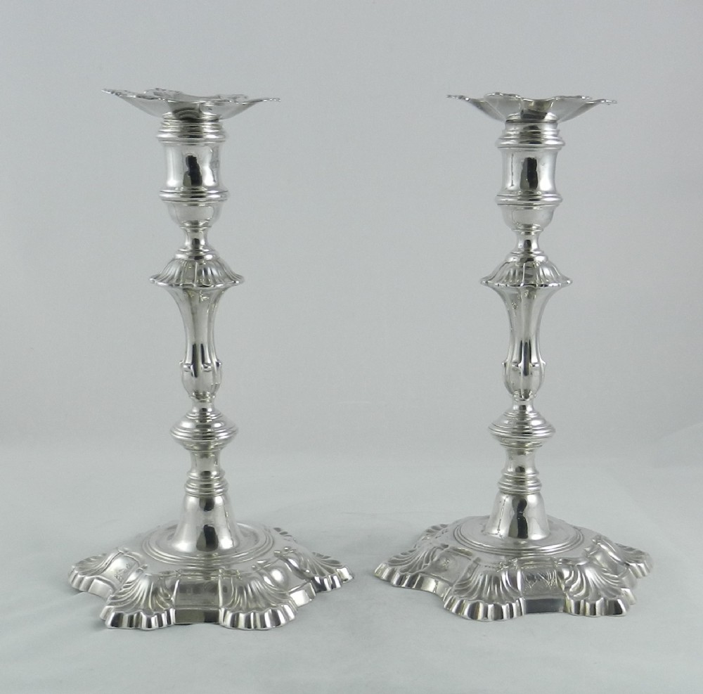 Geo.II Cast Silver Candlesticks.