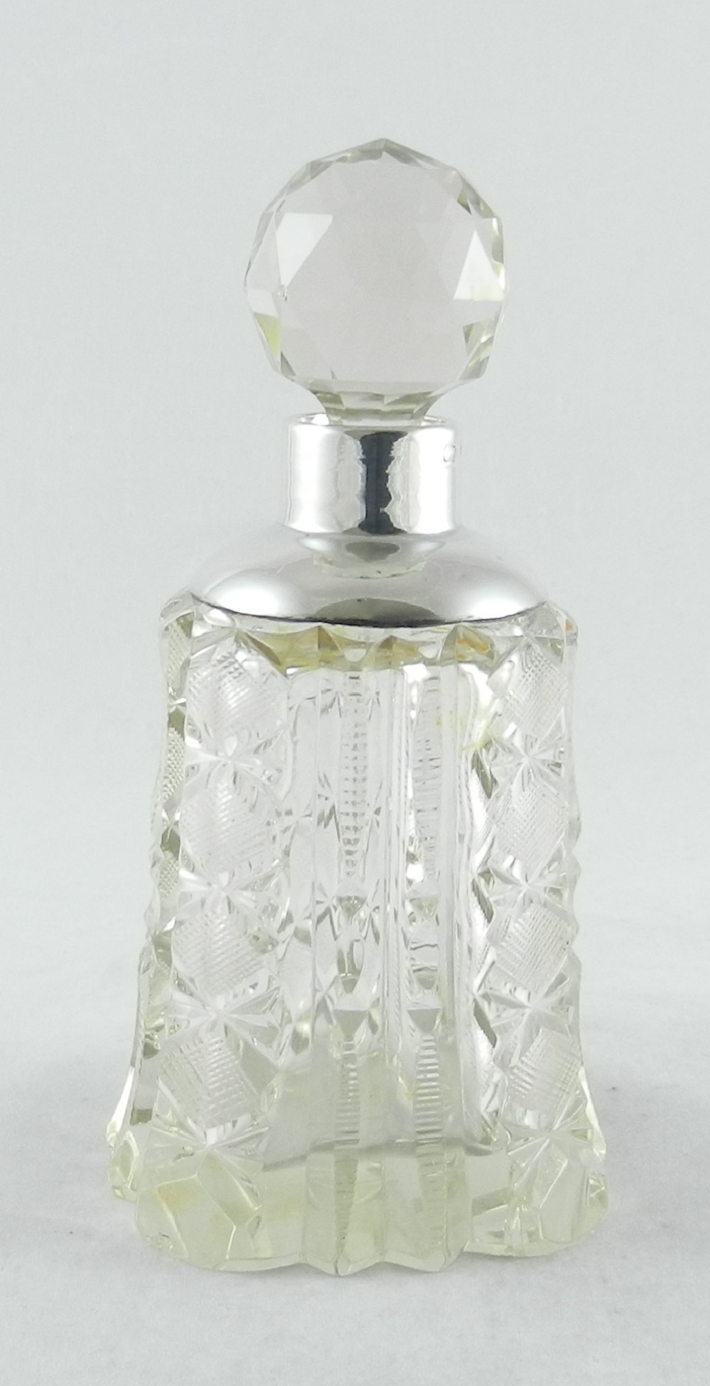 Silver-Mounted Cut Glass Perfume Bottle.