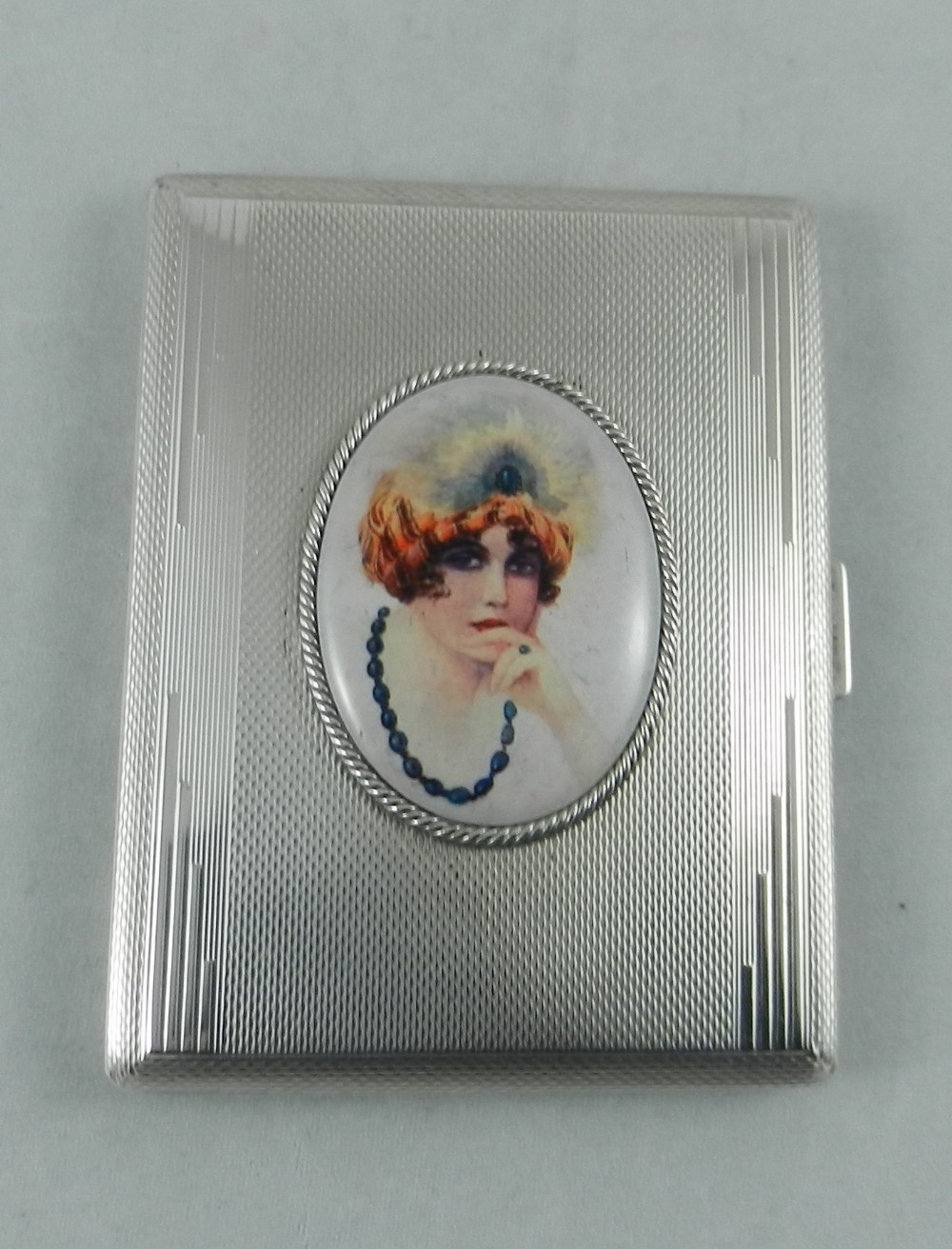 Silver & Enamel Cigarette Case.