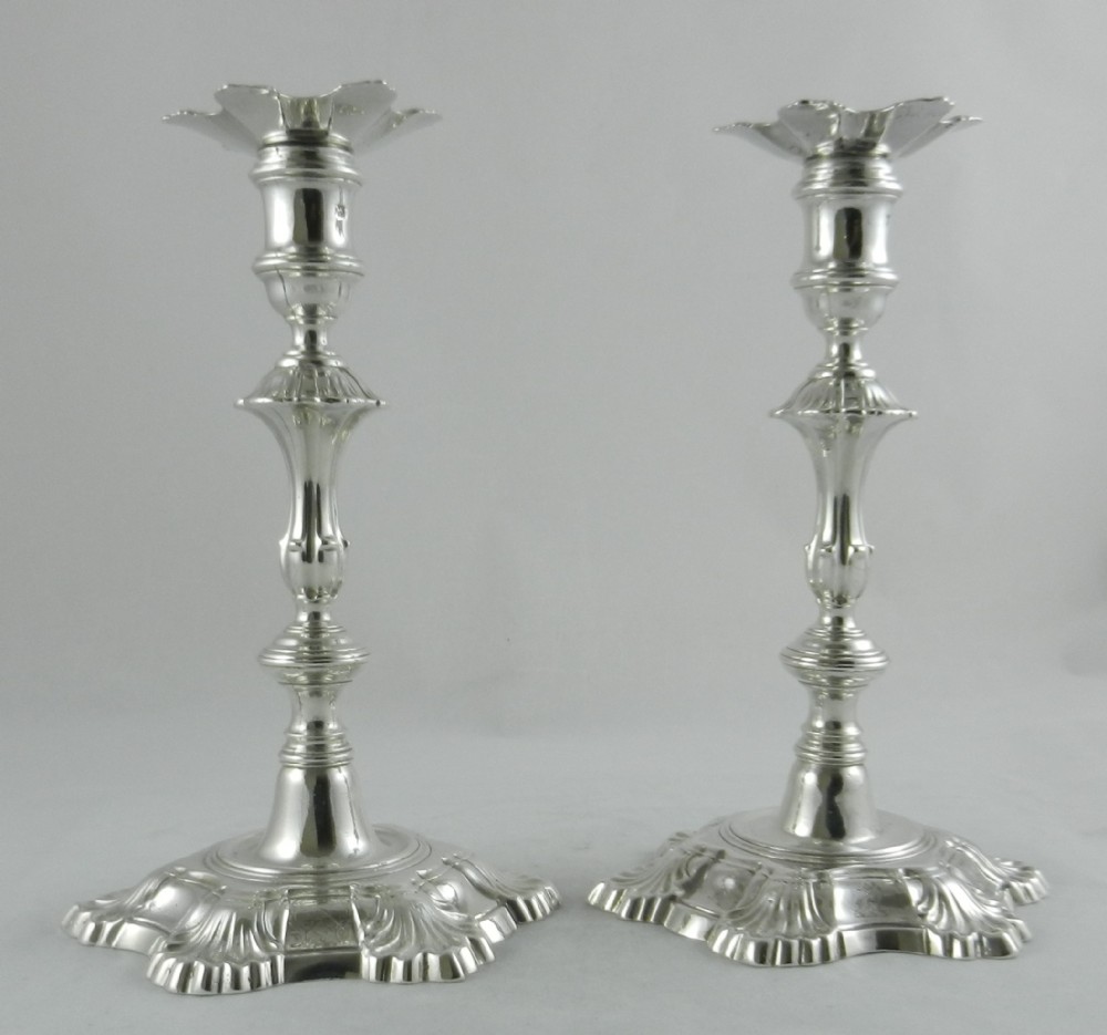 Geo.II Cast Silver Candlesticks.