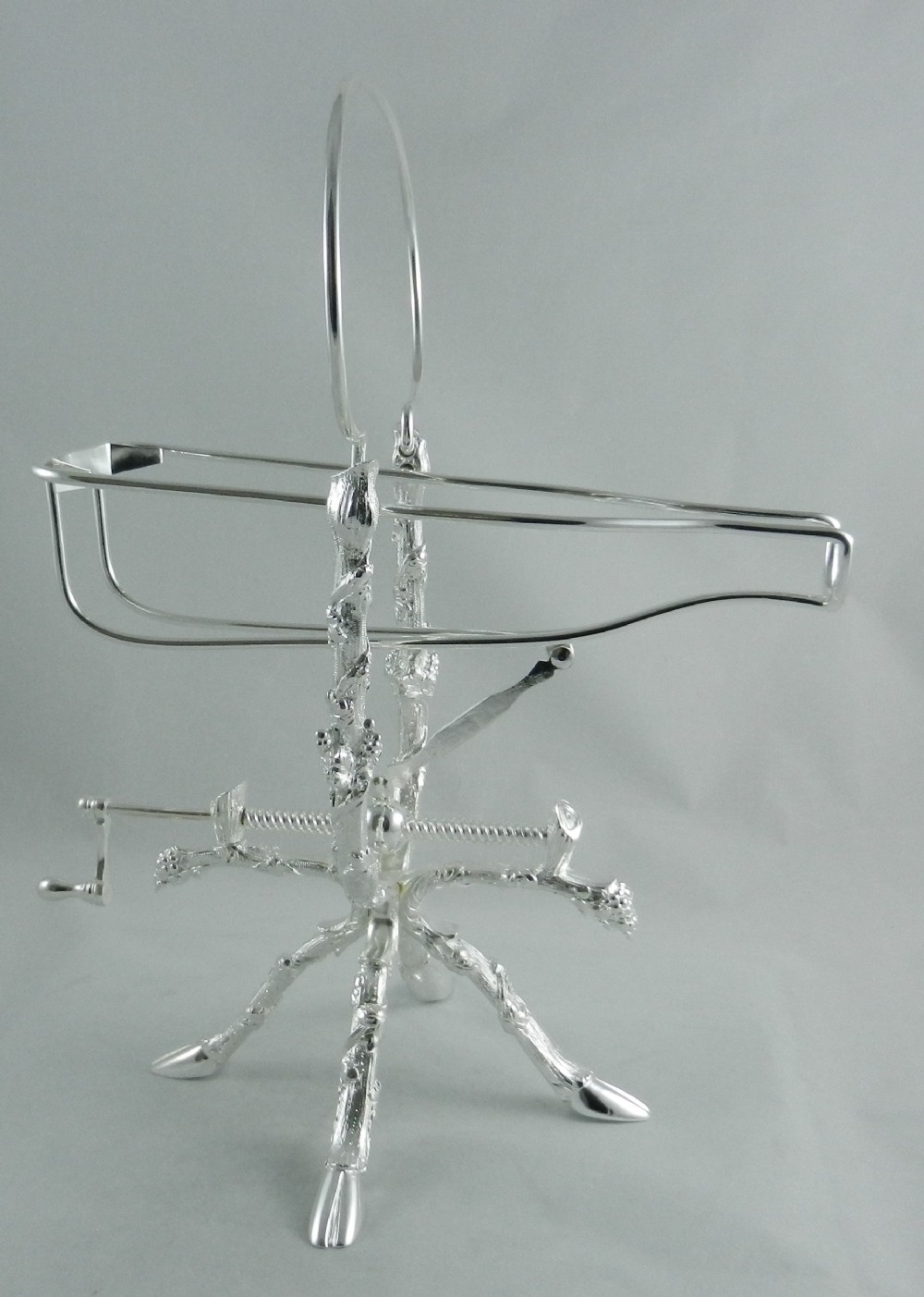 Antique Silver-Plated Wine Cradle.