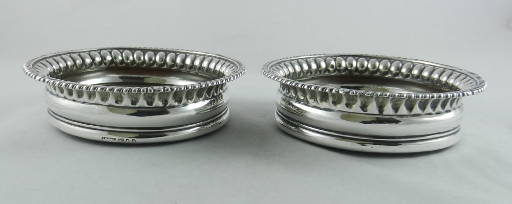 Antique Silver Coasters.
