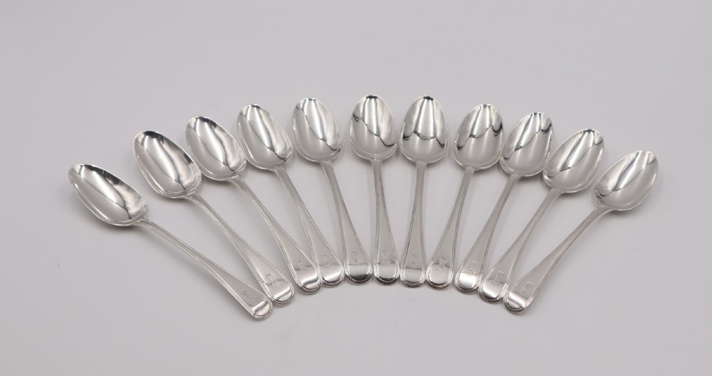 Set Of eleven Antique Silver Dessert Spoons.