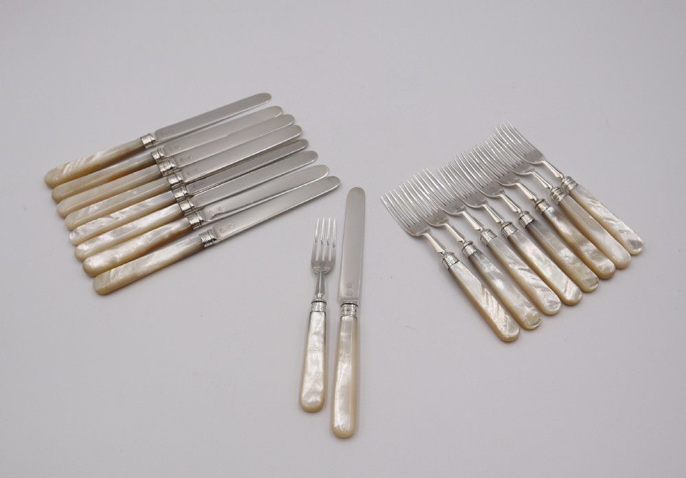 Set  Of Nine Pairs Of Antique  Silver Dessert Cutlery. 