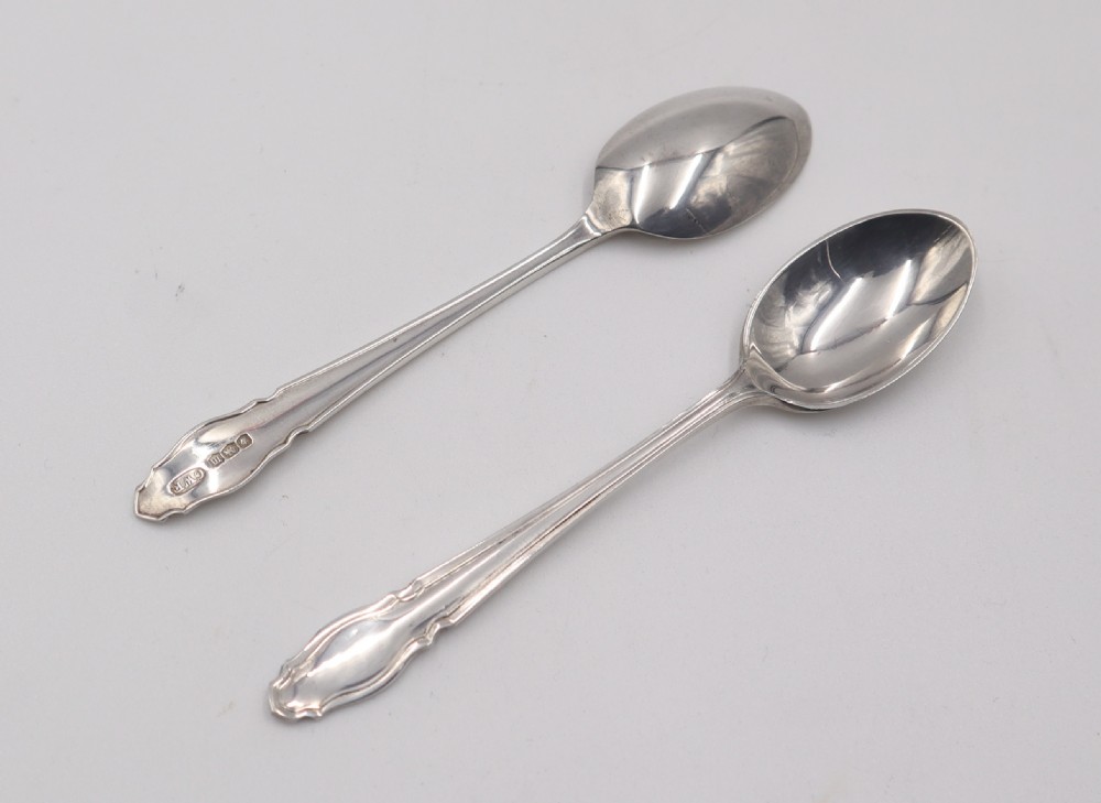 Cased Set Of 12 Silver Spoons & Tongs. View III
