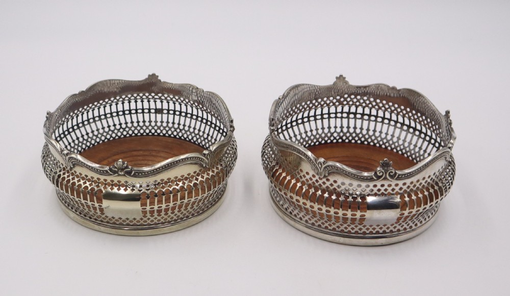 Pair Antique Silverplated Coasters.