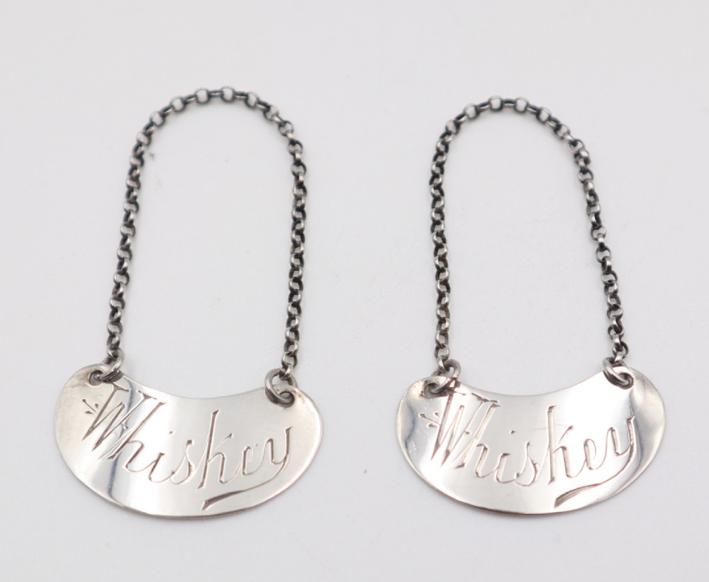 Antique Silver Whiskey Noggin Labels.