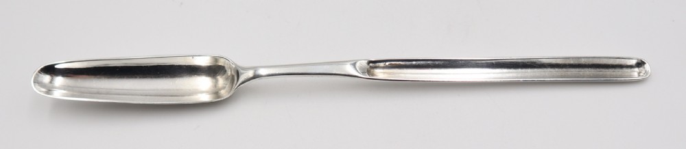 An elongated double-ended sterling silver marrow scoop with a narrow trough at one end and a broader trough at the other. View II