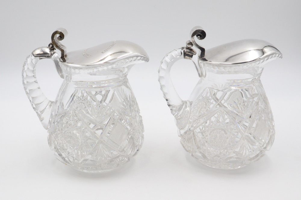Antique Silver Mounted Crystal Jugs.