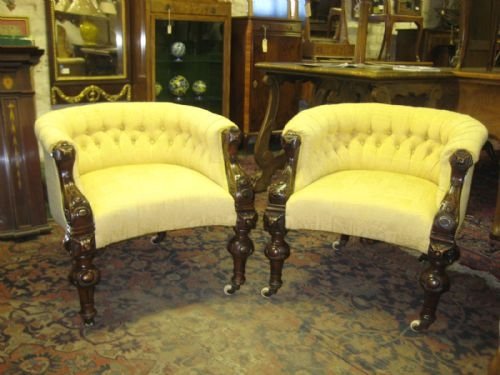Pair of Victorian Carved Deep Buttoned Tub Chairs