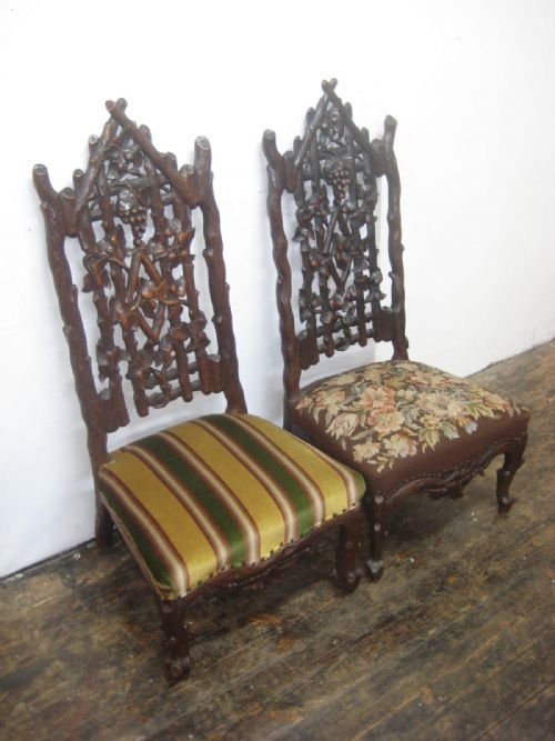 Pair of Black Forest Carved Chairs