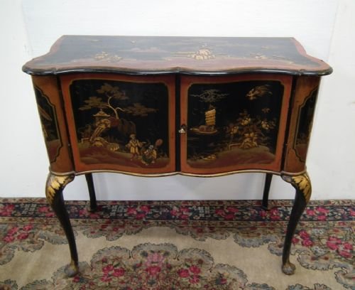 Black and Gilt Serpentine Chinoiserie Cabinet