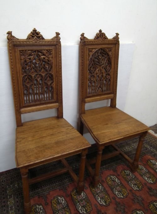 Pair of Gothic Style Carved Oak Hall Chairs