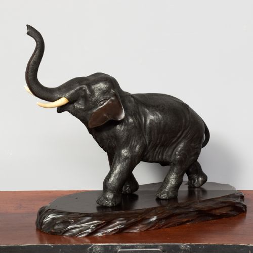  Japanese Bronze elephant with ivory tusks on naturalistic base 