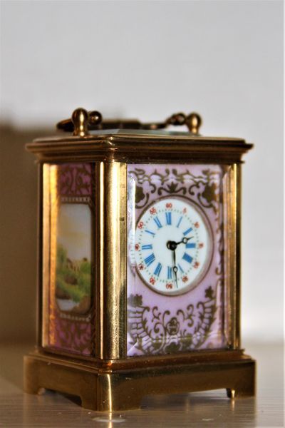 Miniature Gilded Carraige Clock with Four Porcelain Panels